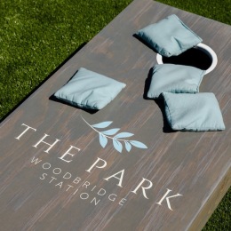 a cornhole game on grass