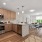 open concept apartment interior with ample lighting throughout