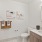 bright bathroom with shower/tub combo