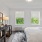 large bedroom with wood-style flooring